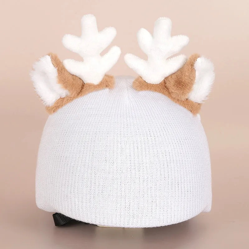Soft plush cartoon character cover on a motorcycle helmet, showing size M and decorative ear sections.