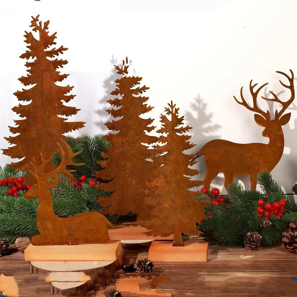 Set of three rusty iron Christmas tree decorations with standing elk figures