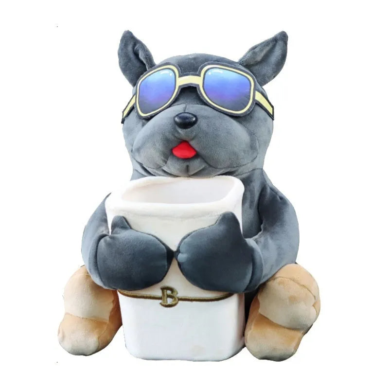 Plush car tissue box holder hanging from flip-down armrest with humorous dog design