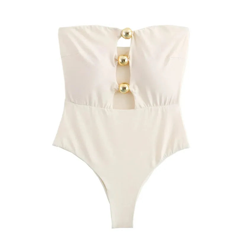 White one-strap swimsuit with metal decoration, slim fit polyester swimwear for women in sizes S, M, L