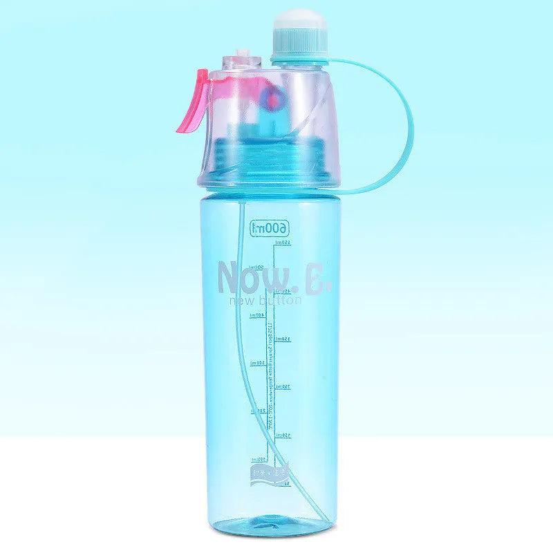 Green portable sports mist spray cup with handle, spray nozzle, and visible water level scale.