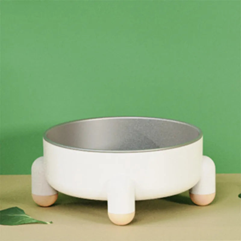 Stainless steel pet bowl with non-slip base and high foot in pink, green, or white colour.