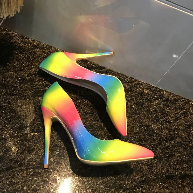 Rainbow coloured patent leather high heels with pointed toe and thin ultra-high heel