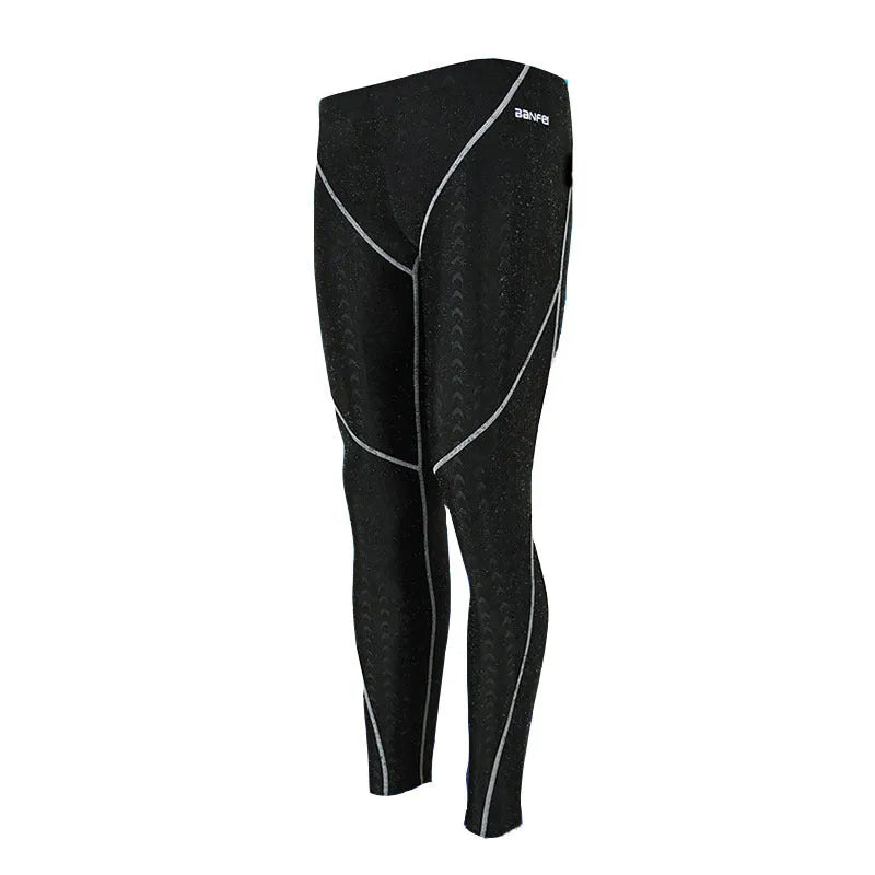 Men's nylon cropped swimming trunks in black with coloured side lines.