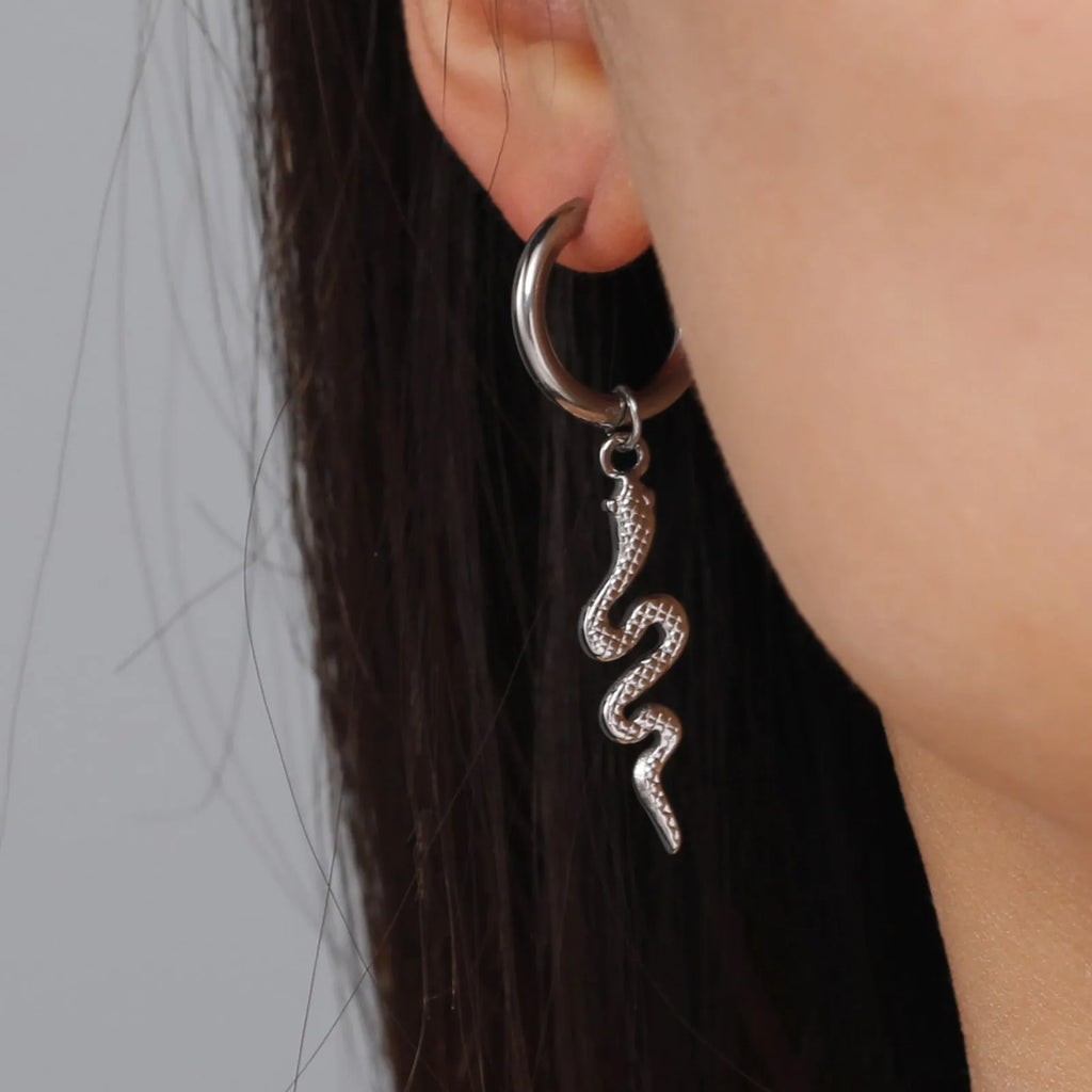 Gold plated stainless steel snake-shaped vintage earrings with ear clip fastening