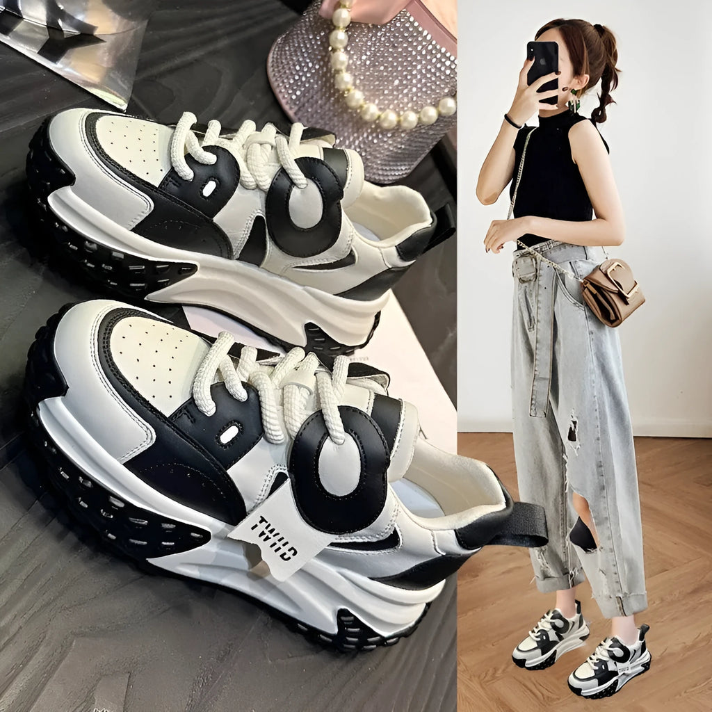 Women's black and white leather casual shoes with thick wedge sole and lace-up front.