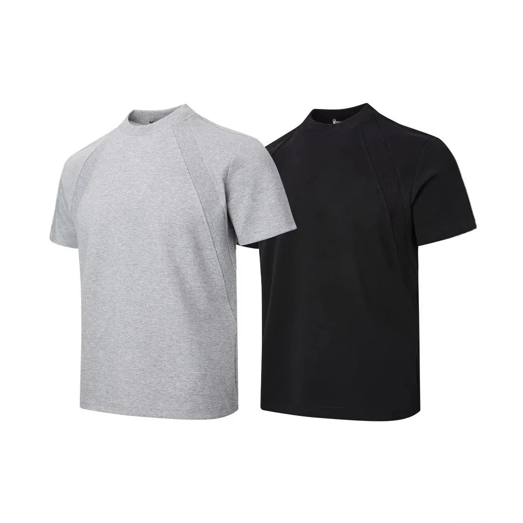 Loose fit short sleeve top with textured air layer stitching on polyester fabric.