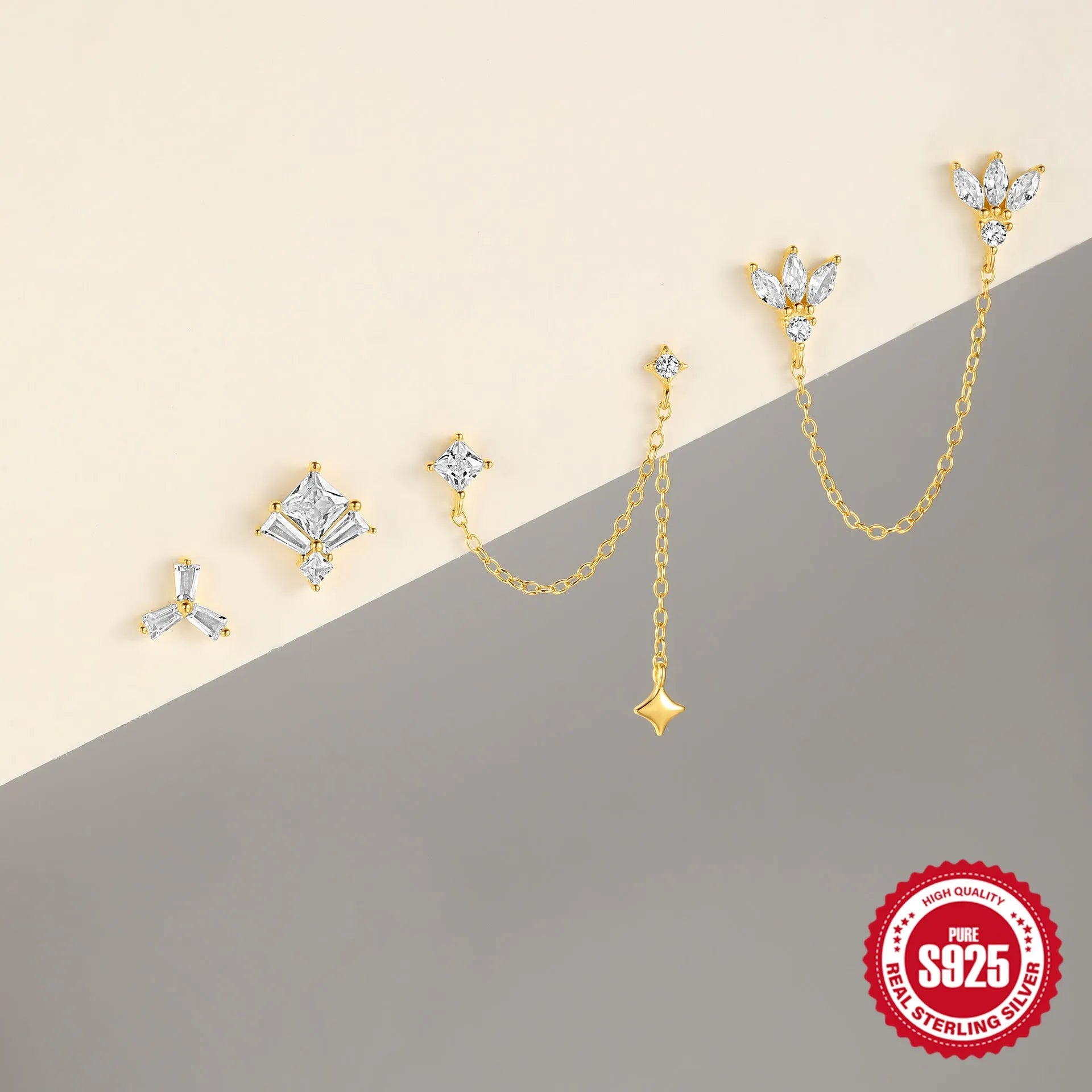 S925 sterling silver geometric stud earrings with inlaid zircon stone in a golden clover design.