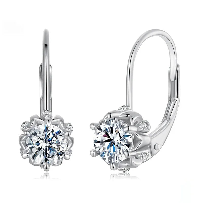 Sterling silver flower bud clip earring with moissanite stone and electroplated platinum finish.