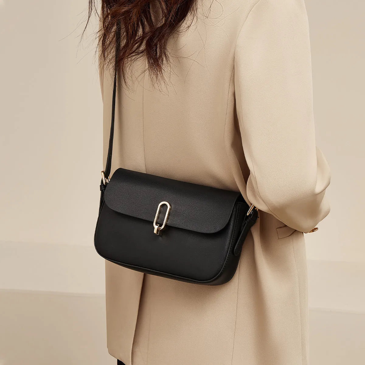 Men's black square shoulder messenger bag made from genuine cowhide leather with lock hardware