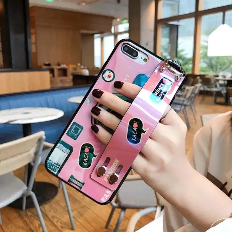 TPU iPhone case with retro camera design in blue or pink, back cover style, optional wrist strap.