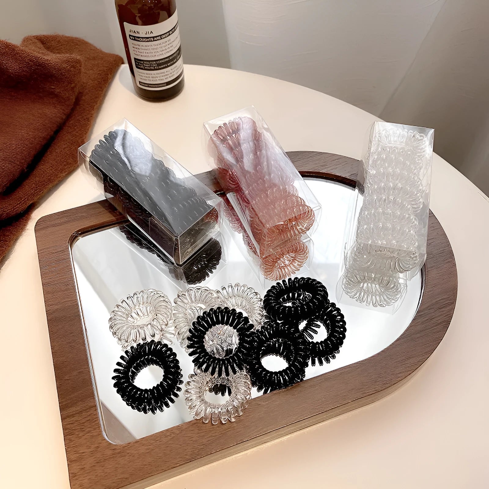 Traceless TPU hair rings in assorted colours on white background