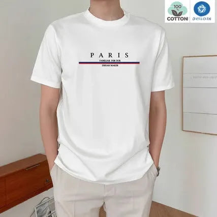 Man wearing a loose-fitting short-sleeved pure cotton t-shirt with a printed design in apricot colour.