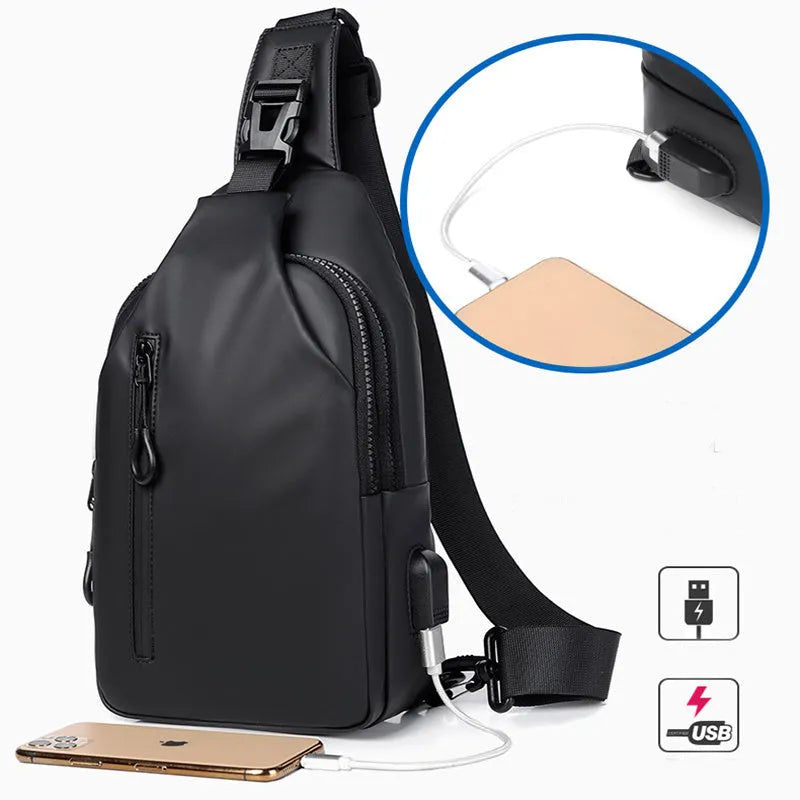 Black sling crossbody chest bag for men with zipper closure and stitched detail on a white background
