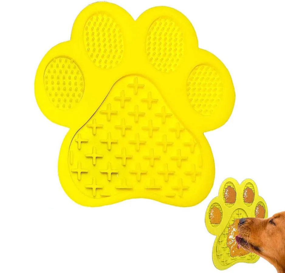 Blue silicone dog licking mat with bone texture and suction cups on back, for use with peanut butter during pet bathing.