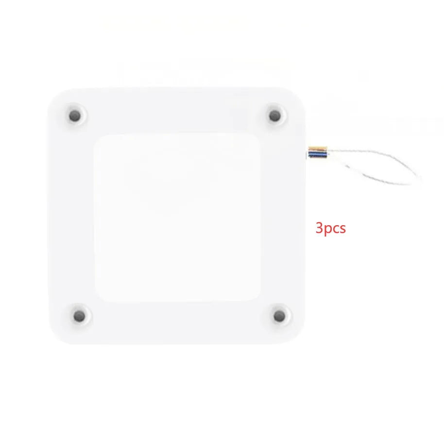 Automatic door closer with adhesive backing and transparent hook for punch-free installation on a door.