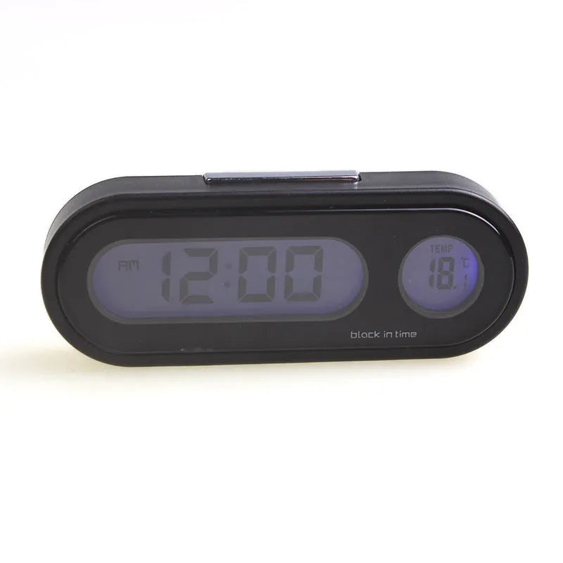 Black electronic car clock and thermometer on an adjustable bracket with luminous LED display.