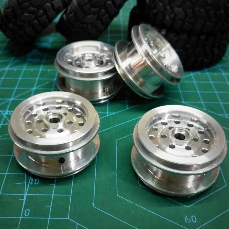 Silver stainless steel RC car wheel upgrade part with 68mm outer diameter and 5mm hexagon.