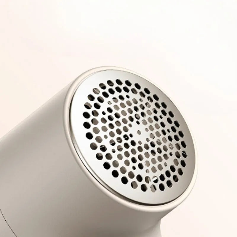 White electric lint remover with digital display and USB charging port