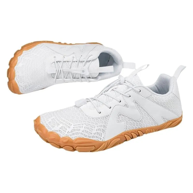 Unisex flyknit-lined climbing shoes with rubber sole in multiple colour options on a climbing hold.