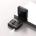 Square black power bank with a built-in white charging cable, showing compact 80mm size.