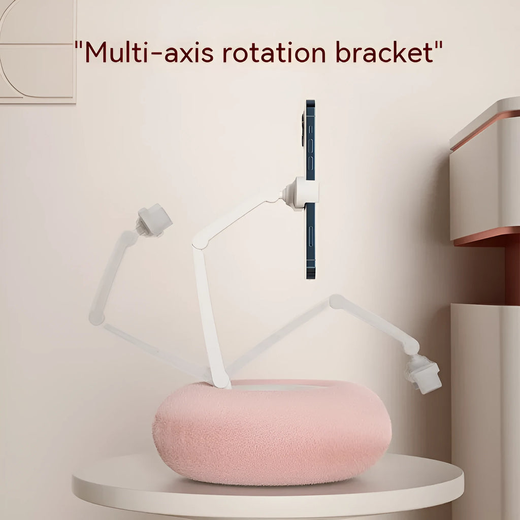 Adjustable rotating bracket holding a tablet, showing vertical extension rod and fabric-covered base.