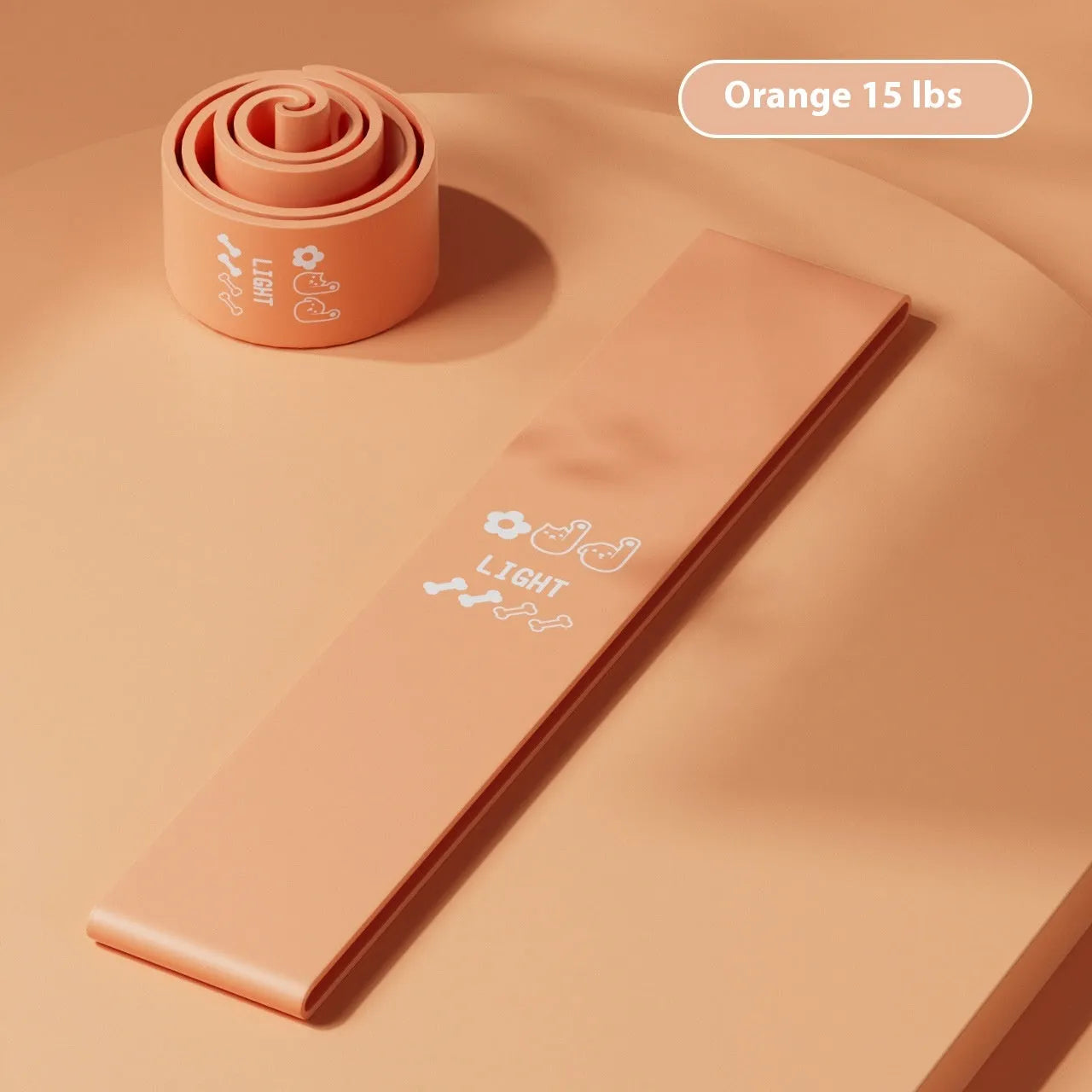 Green, beige, orange, and pink plastic resistance bands showing different tension levels from 10 to 30 pounds.