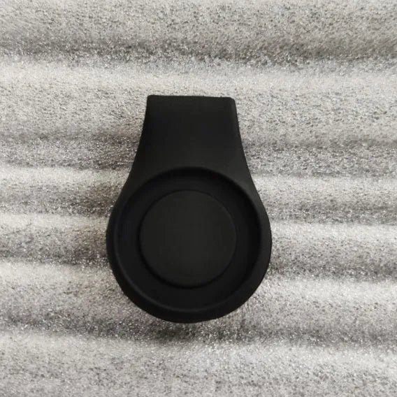 Silicone golf hat clip ball marker holder in ten colours, clipped onto a hat with a metal ball marker.
