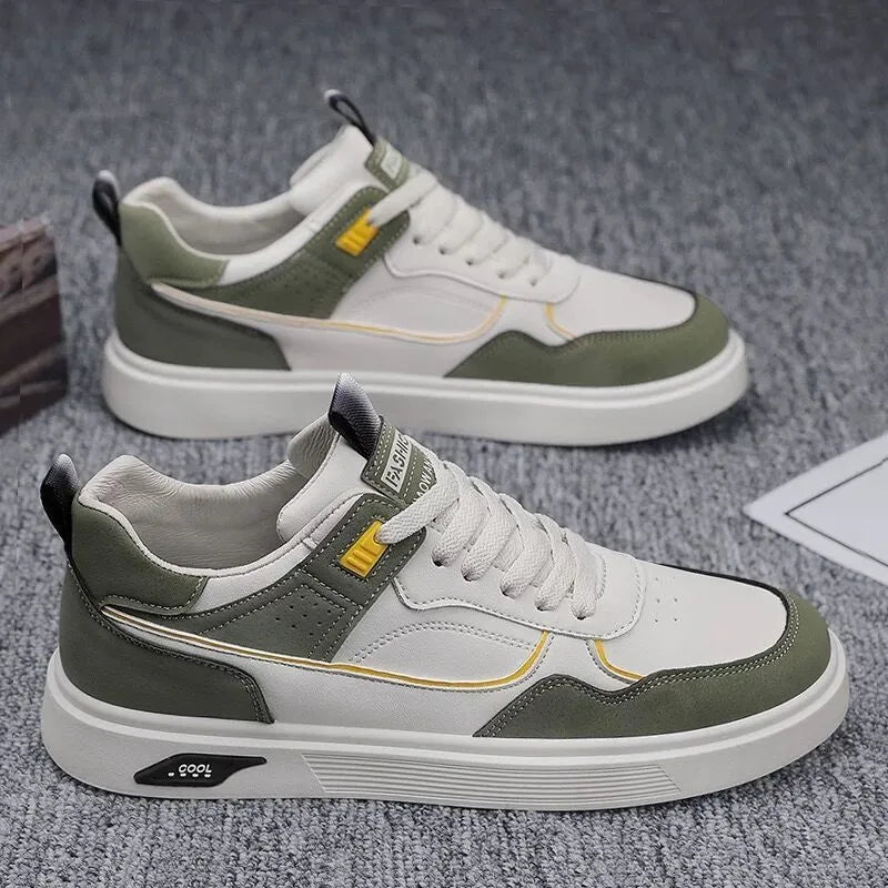 Men's solid colour canvas board shoes with leather stitching and a low-top design.