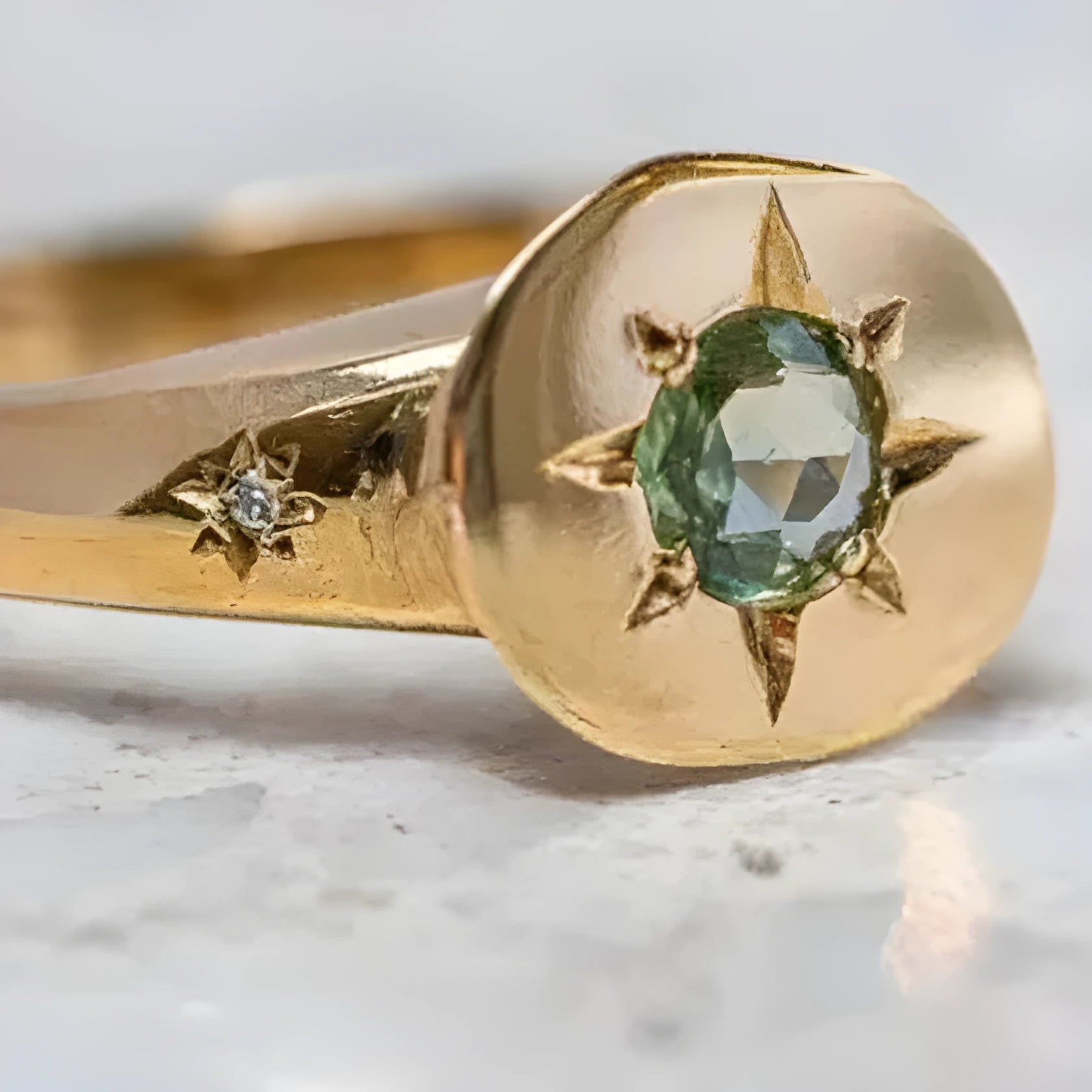 Golden zinc alloy ring with an adjustable opening and a star-shaped zircon asterism design.