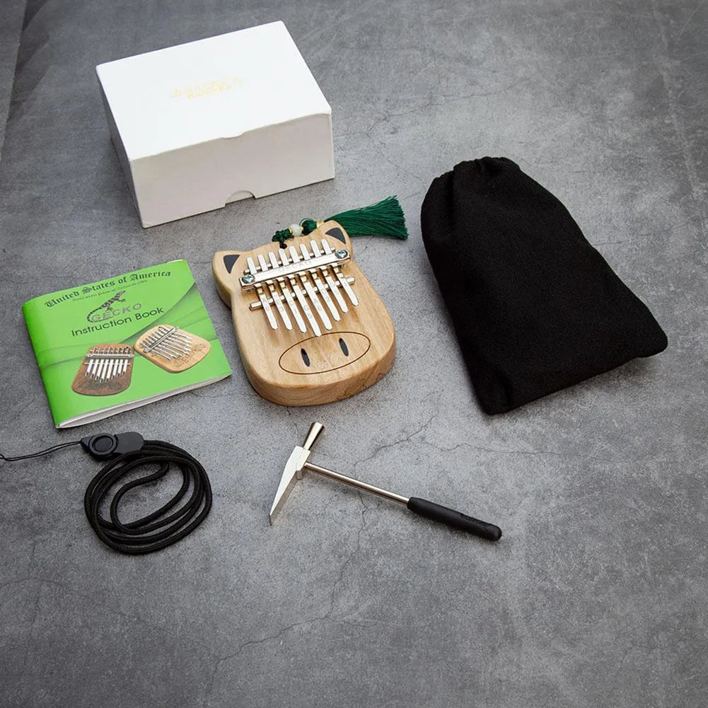Camphorwood Mini K8 keyboard percussion instrument with five C sounds, 11.5 x 9 x 3 cm, natural wood colour.