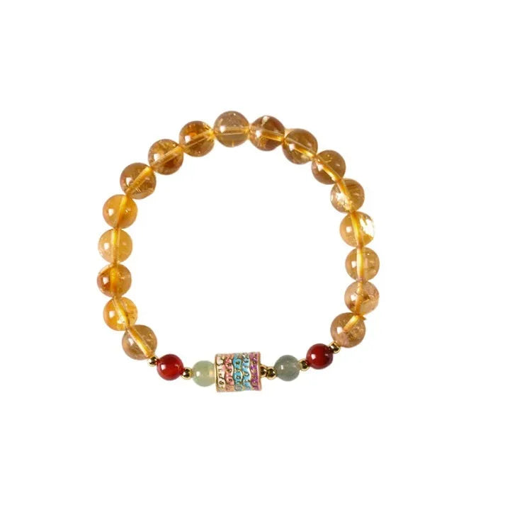 Yellow citrine bracelet with prayer wheel centrepiece and 8mm round beads