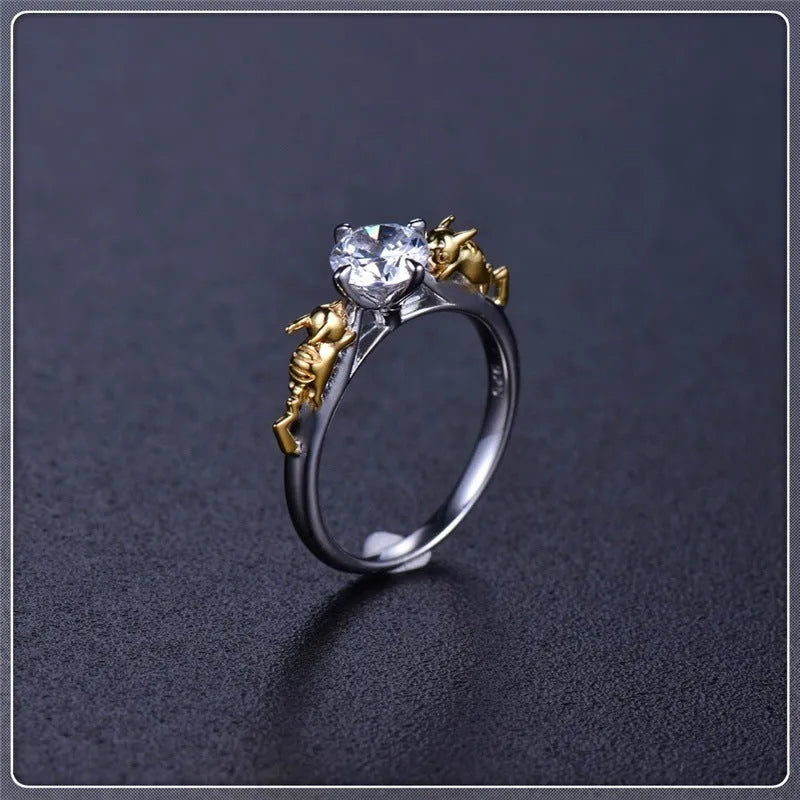 Copper crown motif cosplay ring in a black gold finish.