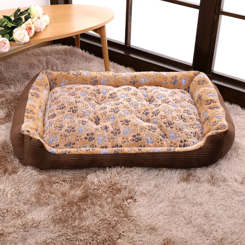 Beige plush dog bed with raised edges and removable cushion for small pets