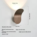 Modern simple wall lamp in brushed gold finish mounted on living room wall