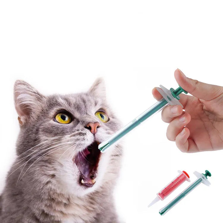 Two pet pill shooters with soft silicone tips for administering cat and dog medicine.