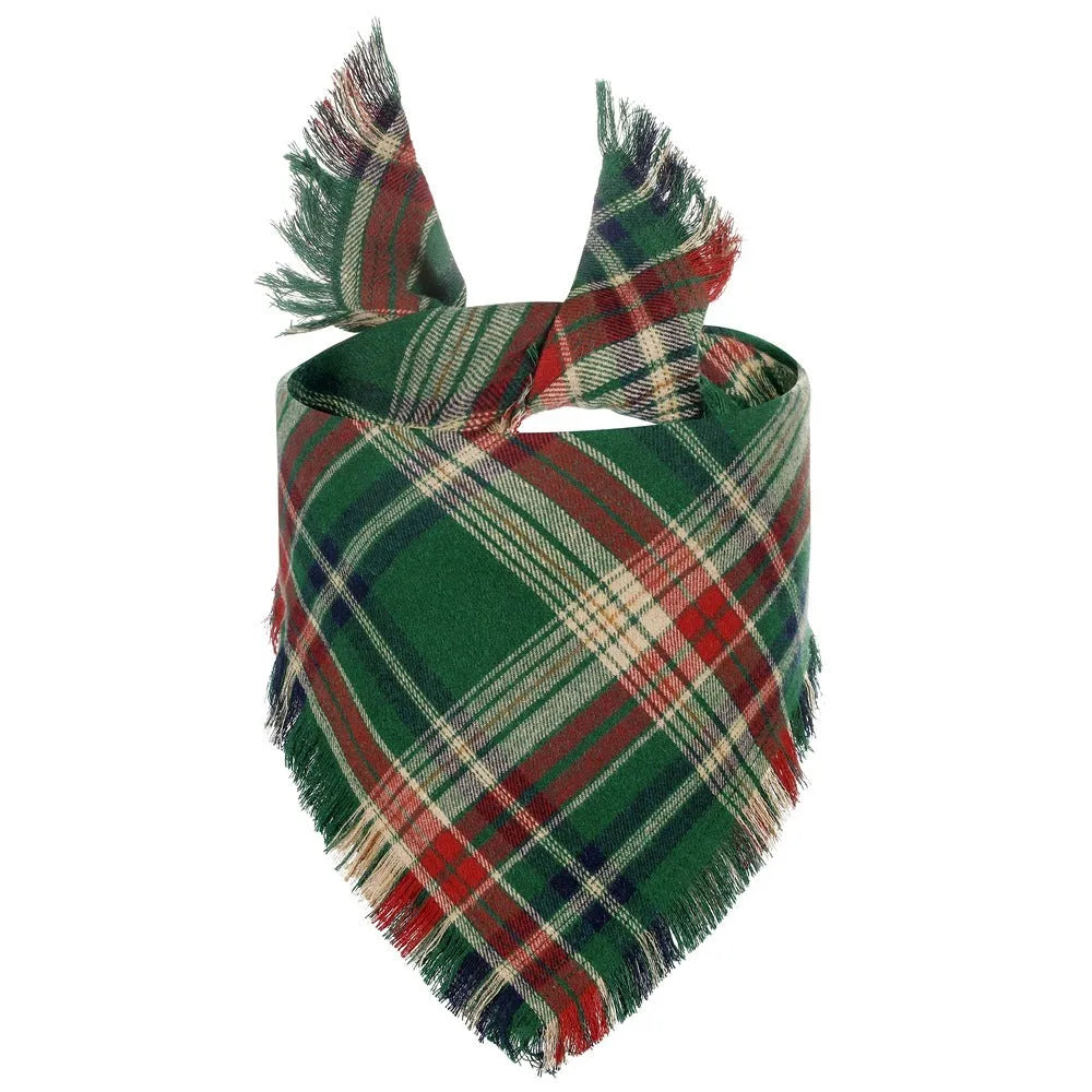 Brown, green, orange, red, and yellow plaid dog bandana with tassels on the edges.