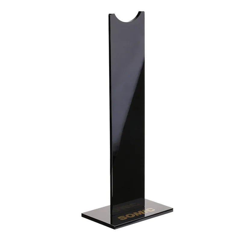 Detachable head-mounted headset bracket stand on a non-slip silicone base.