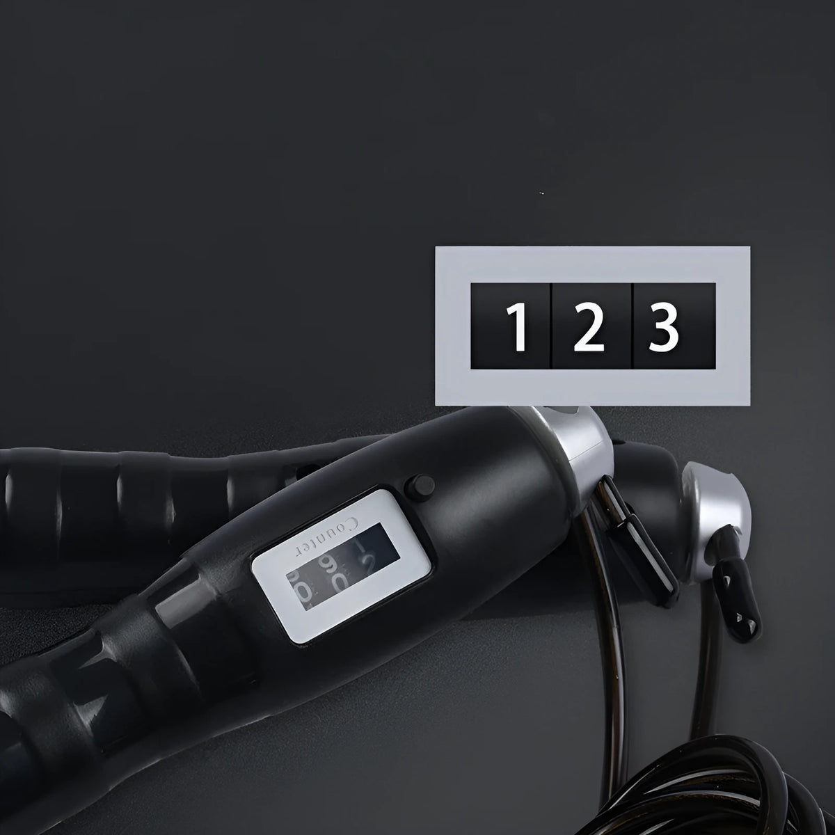 Adjustable digital skipping rope with ABS handles and TPU coated steel cable in black and pink for fitness exercise.