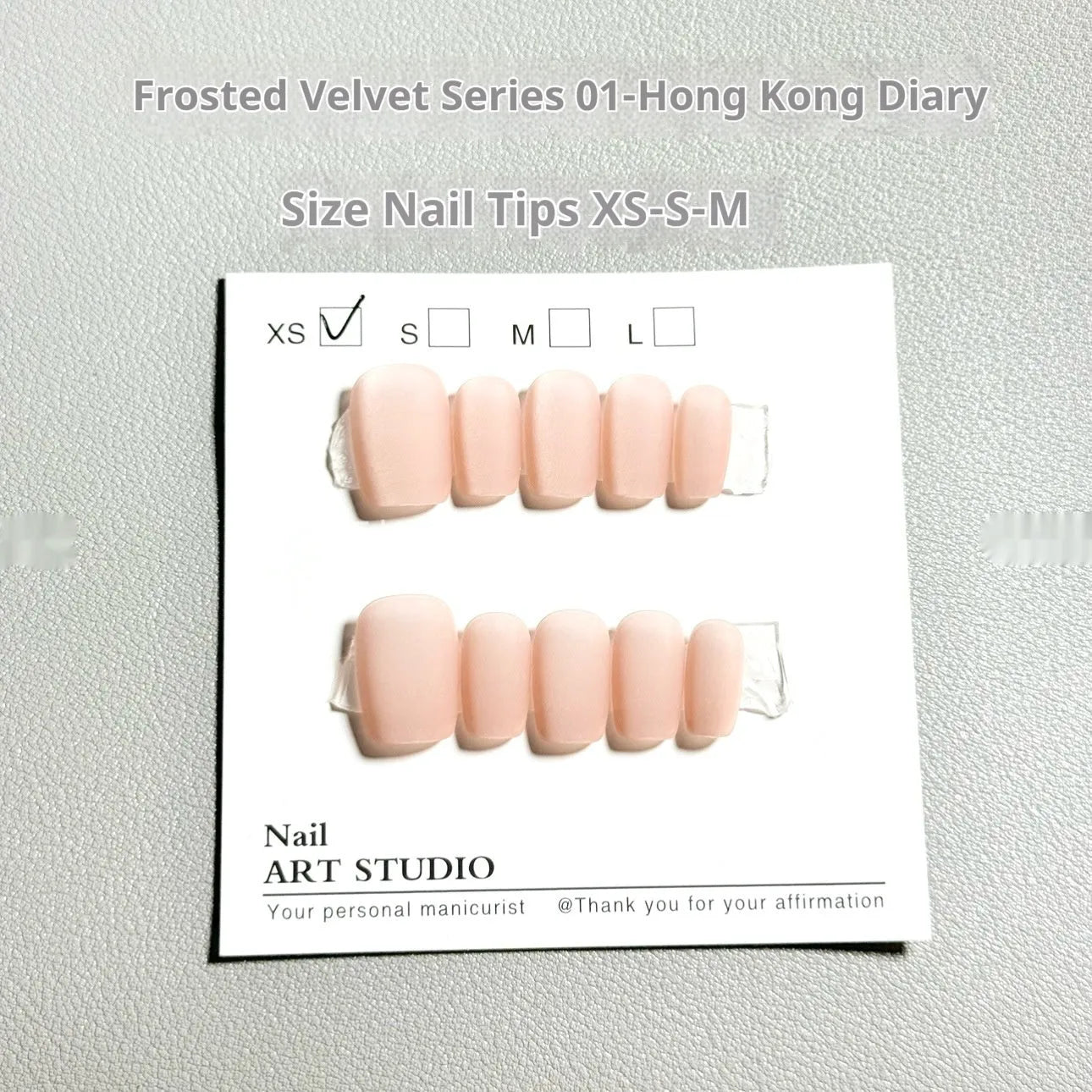 Frosted Velvet Cat's Eye press-on nails with Aurora iridescent shine, shown in short ladder sizes.