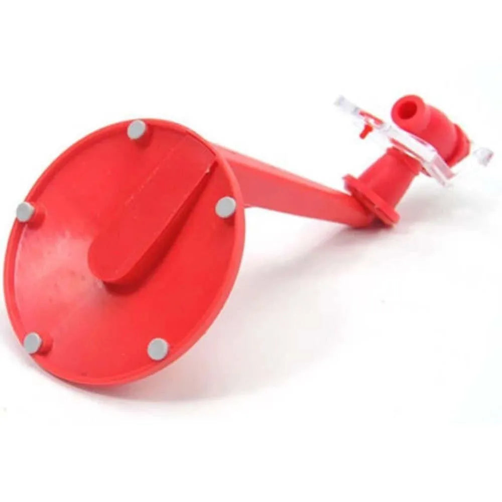 Red plastic Magic Tap soda drink dispenser attached to an inverted 2-litre bottle
