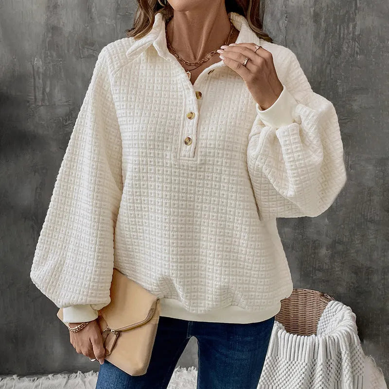 Women's milky white textured polo collar sweater on a hanger.