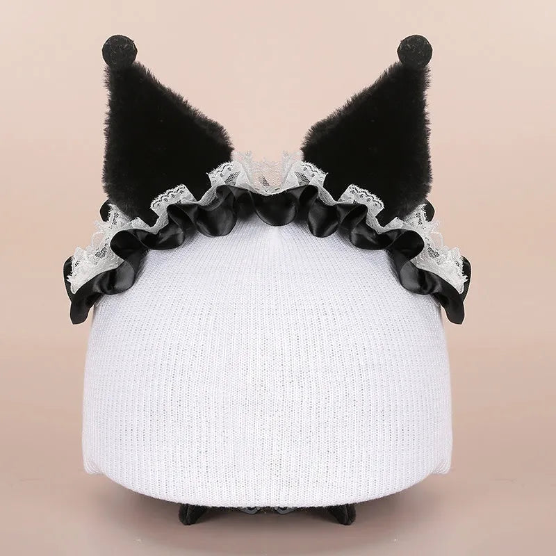 Soft plush cartoon character cover on a motorcycle helmet, showing size M and decorative ear sections.