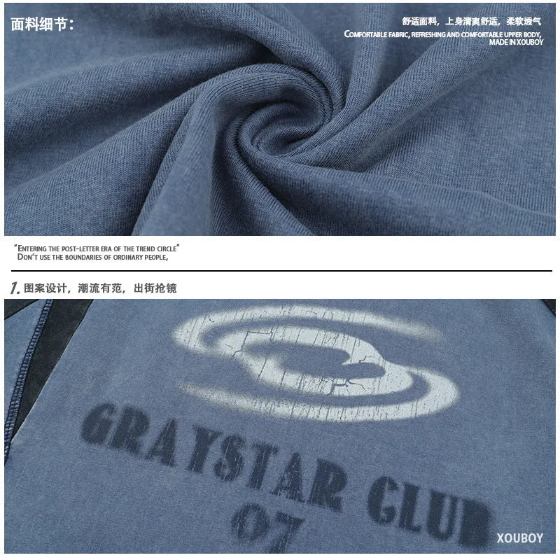Men's blue hip hop letter print t-shirt with raglan sleeves on a hanger