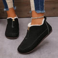Women's suede retro low top boots in black showing low-top profile and rubber sole