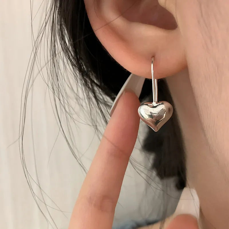 Korean style heart earrings with three-dimensional glossy finish and silver white gold plating