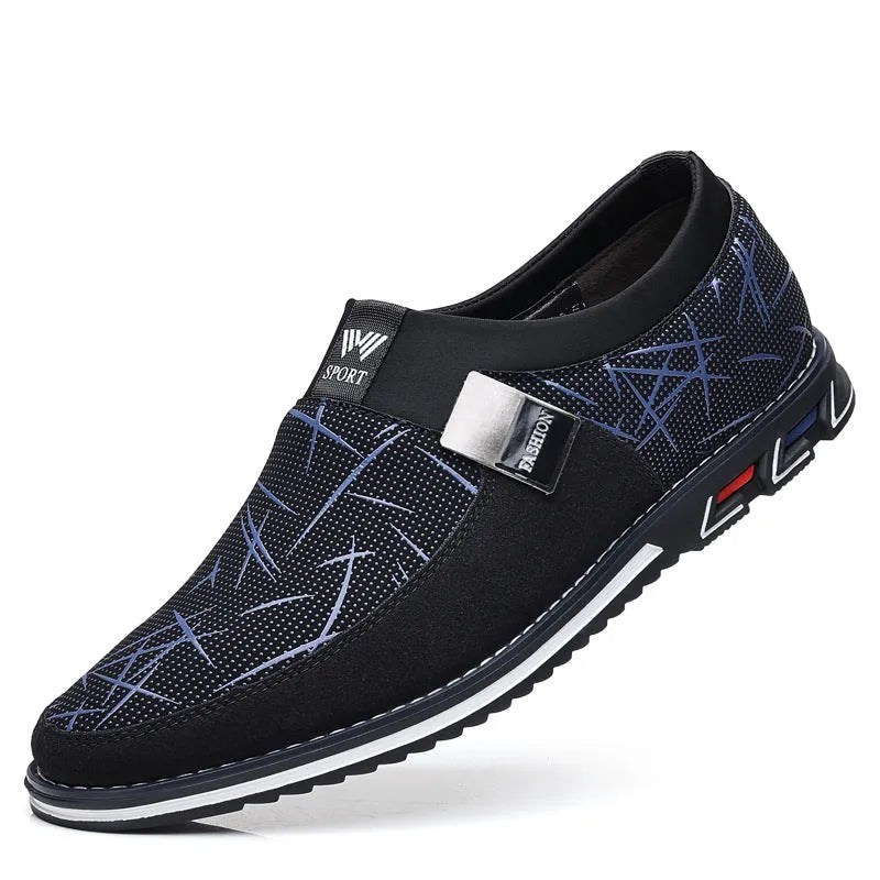 Men's synthetic leather slip-on casual shoe in black, showing square toe and flat rubber sole.