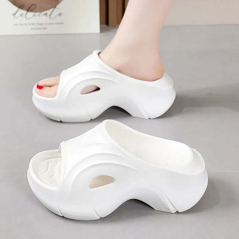 Women's thick-soled EVA foam slippers in rose red colour with round toe design