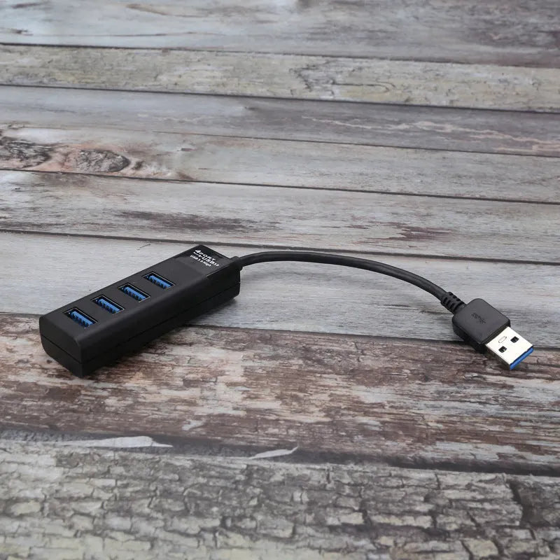 USB 3.0 hub with four ports, LED indicators, and 30cm cable for computer connectivity expansion