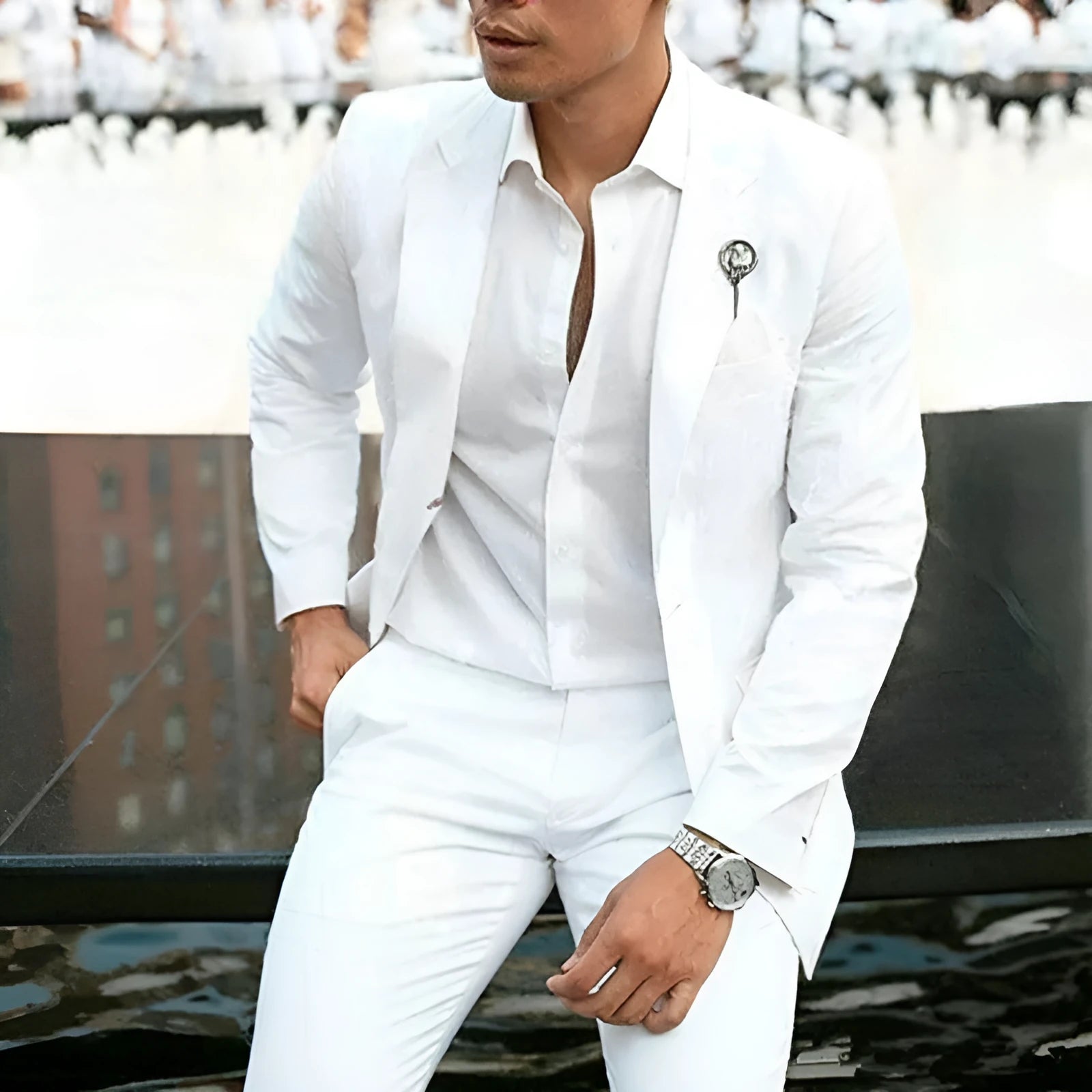 White men's slim fit two-piece suit on a hanger, suitable for weddings.
